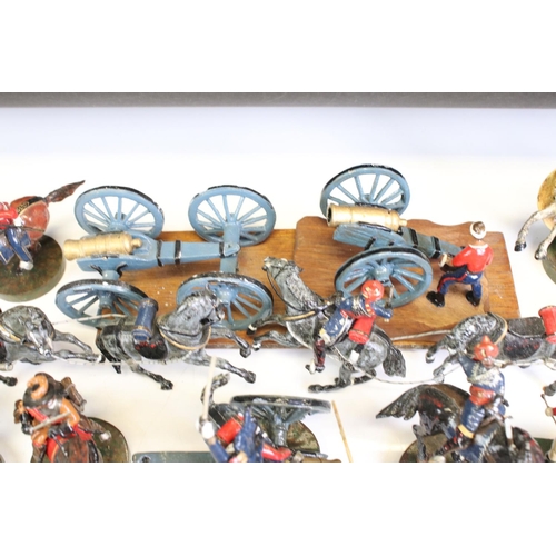 160 - Over 40 painted metal figures to include British soldiers, mounted soldiers, native African warriors... 