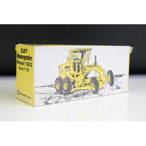 1360 - Four boxed construction diecast models to include 2 x NZG Modelle CAT Caterpillar (528 Log Skidder; ... 