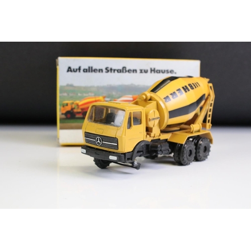 1360 - Four boxed construction diecast models to include 2 x NZG Modelle CAT Caterpillar (528 Log Skidder; ... 