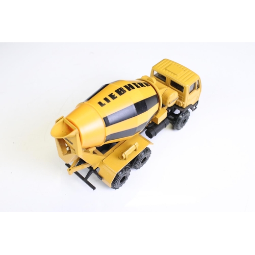 1360 - Four boxed construction diecast models to include 2 x NZG Modelle CAT Caterpillar (528 Log Skidder; ... 