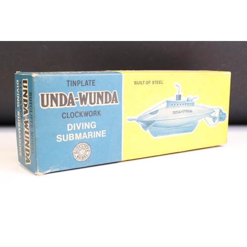 1301A - Boxed Sutcliffe Model tinplate Unda Wunda clockwork diving submarine in pale blue, with key (an area... 