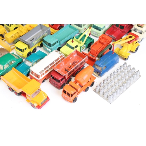 1309 - Around 35 mid 20th C diecast models to include mainly Matchbox 75 Series examples, features commerci... 