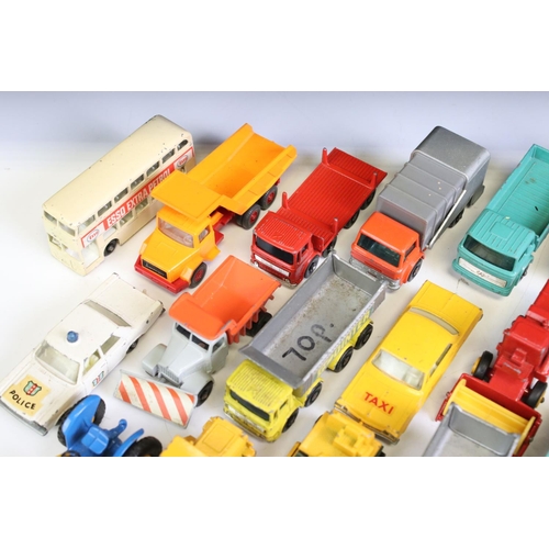 1309 - Around 35 mid 20th C diecast models to include mainly Matchbox 75 Series examples, features commerci... 