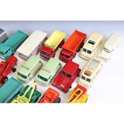 1309 - Around 35 mid 20th C diecast models to include mainly Matchbox 75 Series examples, features commerci... 