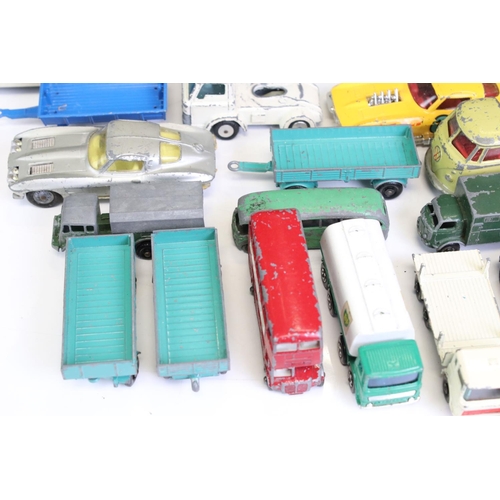 1313 - 37 Mid 20th C play worn diecast models to include Corgi, Matchbox and Husky, featuring Husky Hoynor ... 