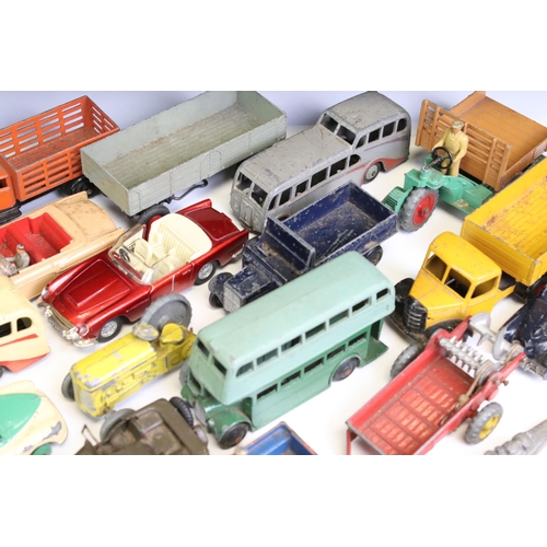 1346 - Around 35 mid 20th C play worn diecast models to include mainly Dinky examples plus Britains and Cor... 