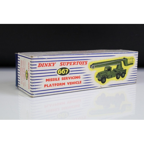 1380 - Two boxed Dinky military diecast models to include 667 Missile Servicing Platform Vehicle and 666 Mi... 