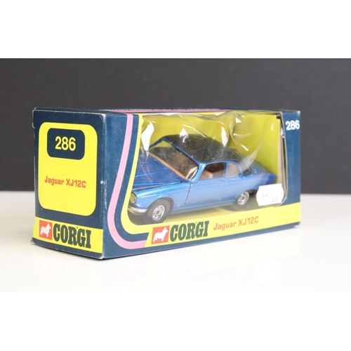 1335 - Four boxed Corgi diecast models to include 238 'By Special Request' Jaguar Mark X in pale blue (box ... 