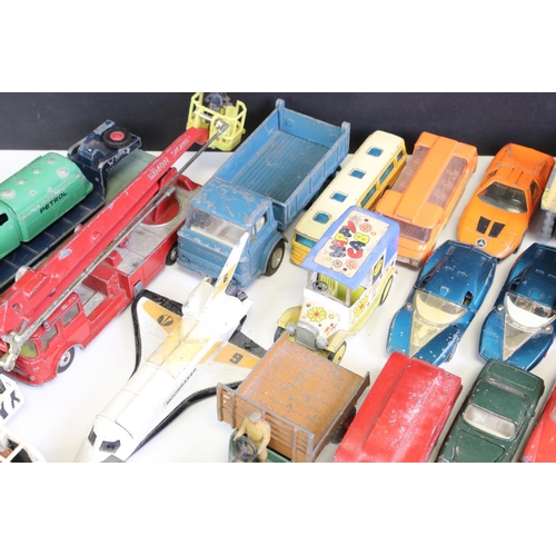 1338 - Around 40 mostly mid 20th C play worn diecast models, to include Dinky and Corgi, featuring Corgi ER... 