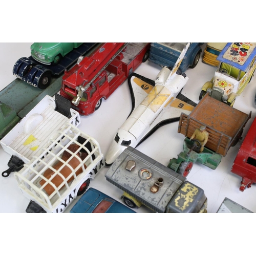 1338 - Around 40 mostly mid 20th C play worn diecast models, to include Dinky and Corgi, featuring Corgi ER... 