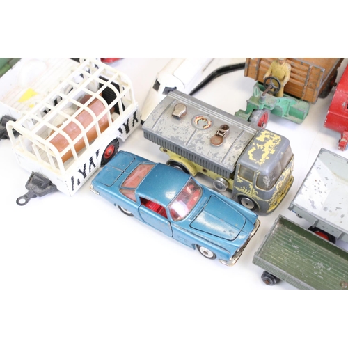 1338 - Around 40 mostly mid 20th C play worn diecast models, to include Dinky and Corgi, featuring Corgi ER... 