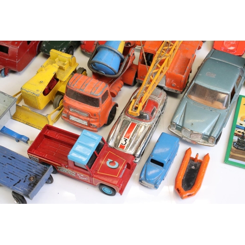 1338 - Around 40 mostly mid 20th C play worn diecast models, to include Dinky and Corgi, featuring Corgi ER... 