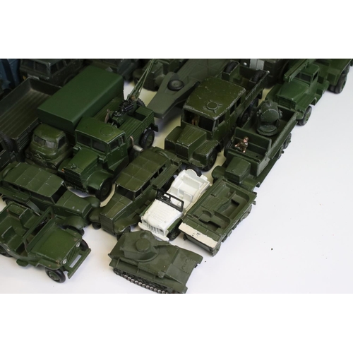 1342 - Around 45 Dinky mid 20th C military diecast models to include Tous Terrains Berliet, 719 Spitfire Mk... 