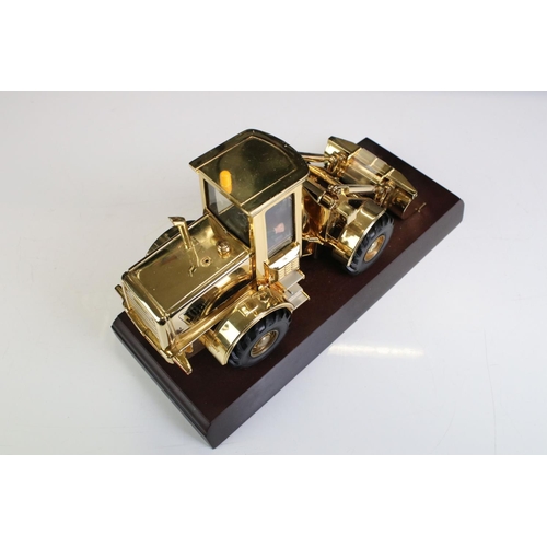 1225 - Boxed JCB 414S Farm Master diecast model finished in gold plate, diecast shows light surface scratch... 