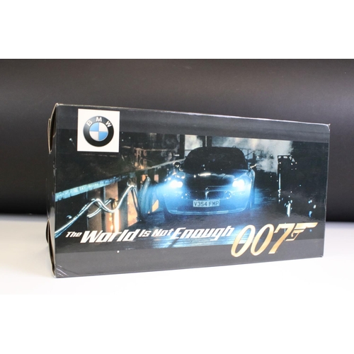 1226 - Four Boxed James Bond 007 BMW diecast models & multi-model sets, 1:87 to 1:18 scale, to include Kyos... 