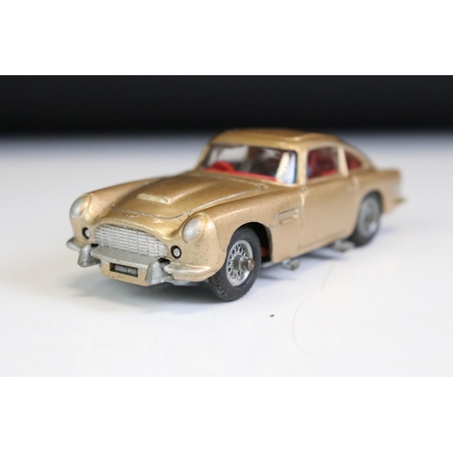 1410 - Boxed Corgi 261 James Bond Aston Martin DB5 diecast model with 2 x ejector figures and secret instru... 