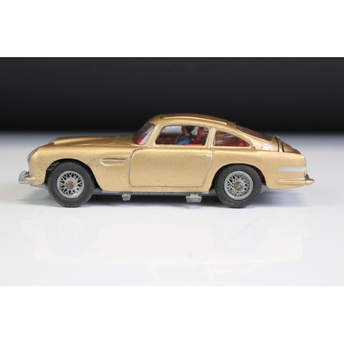 1410 - Boxed Corgi 261 James Bond Aston Martin DB5 diecast model with 2 x ejector figures and secret instru... 