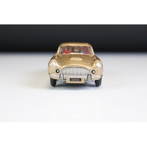 1410 - Boxed Corgi 261 James Bond Aston Martin DB5 diecast model with 2 x ejector figures and secret instru... 