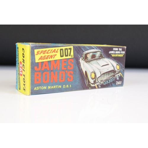 1410 - Boxed Corgi 261 James Bond Aston Martin DB5 diecast model with 2 x ejector figures and secret instru... 