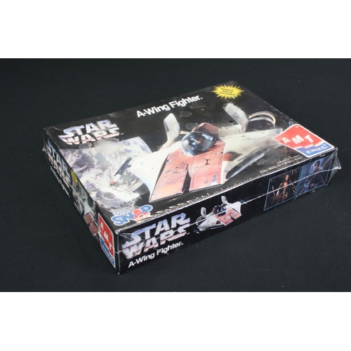 233 - Star Wars - Two sealed boxed AMT plastic model kits to include 8933 A-Wing Fighter & 30117 Naboo Fig... 