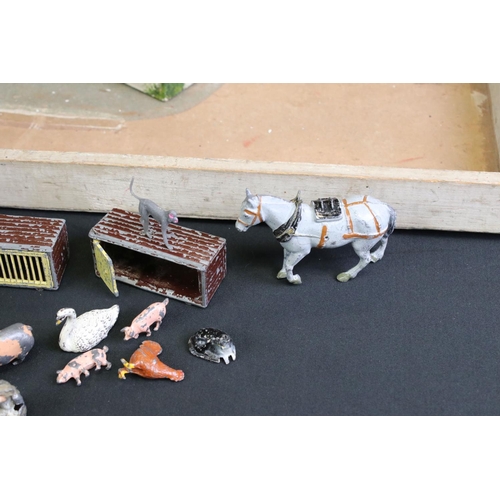 160A - Collection of play worn Britains metal farm animal figures and accessories plus 2 x wooden farmyards... 