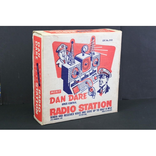 237 - Boxed Merit Dan Dare Space Control Radio Station, no. 3110, contents appear gd other than missing in... 