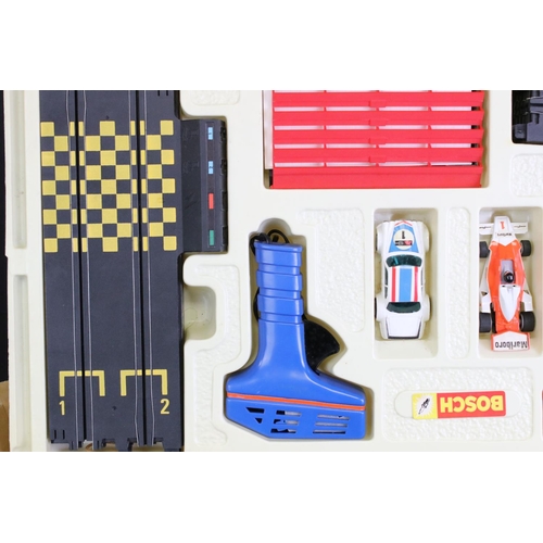 242 - Two Boxed Matchbox Powertrack slot car racing sets to include Grand Prix 1000 and Super Sport 3000 (... 