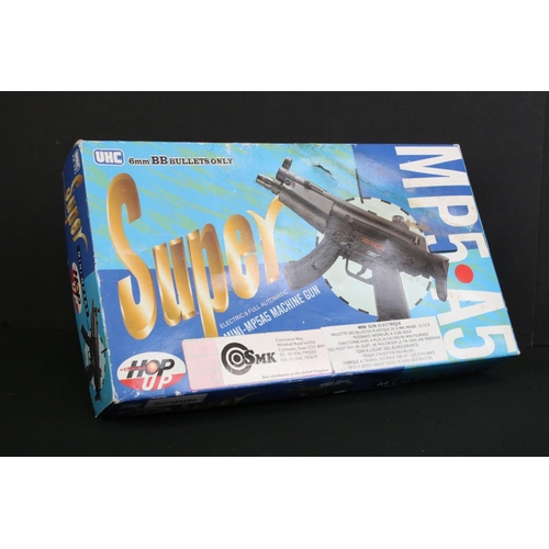 244 - Three plastic toy BB guns to include a boxed Super UHC MMP5 A5 Mini Machine Gun