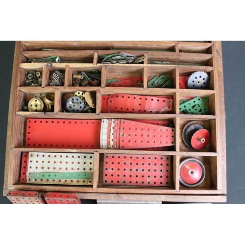 251 - Collection of early-to-mid 20th C Meccano, a variety of pieces to include wheels, plates & rods, hou... 