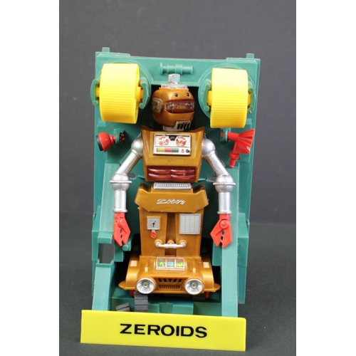 256 - Cased Ideal Toys Zeroids ' Zobor ' motorised plastic robot figure, in orange & metallic grey (showin... 