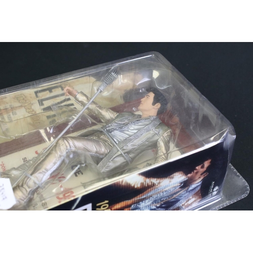 258 - Three boxed McFarlane Elvis Presley figures to include Las Vegas Elvis, Aloha Elvis and 1956 The Yea... 