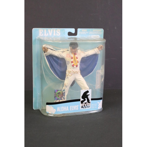 258 - Three boxed McFarlane Elvis Presley figures to include Las Vegas Elvis, Aloha Elvis and 1956 The Yea... 