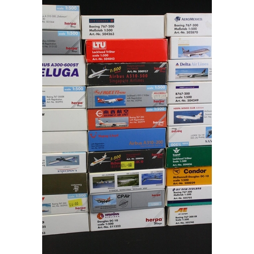 1217 - 70 Boxed Herpa 1/500 diecast models of commercial planes to include AeroMexico, Hawaiian Airlines, L... 