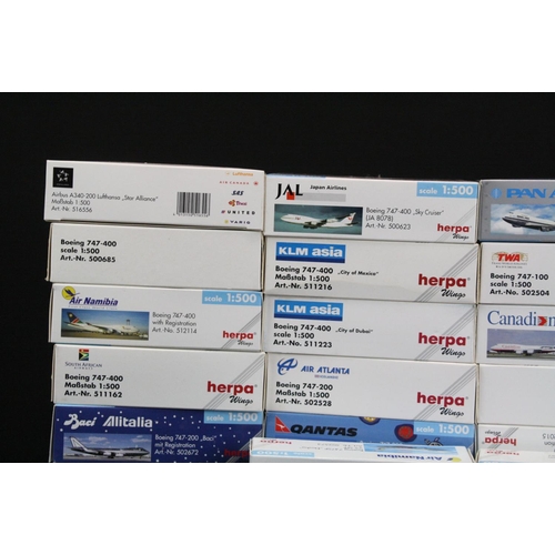 1218 - 34 Boxed Herpa 1/500 diecast models of commercial planes to include Japan Airlines, United Airlines,... 