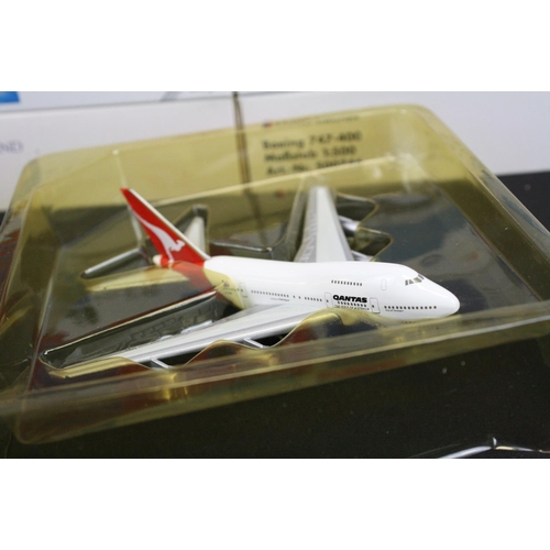 1218 - 34 Boxed Herpa 1/500 diecast models of commercial planes to include Japan Airlines, United Airlines,... 