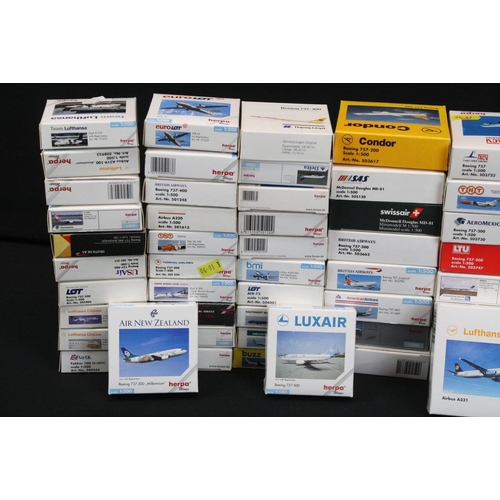 1219 - Over 85 boxed Herpa 1/500 diecast commercial plane models to include Southwest Airlines, Condor, Luf... 