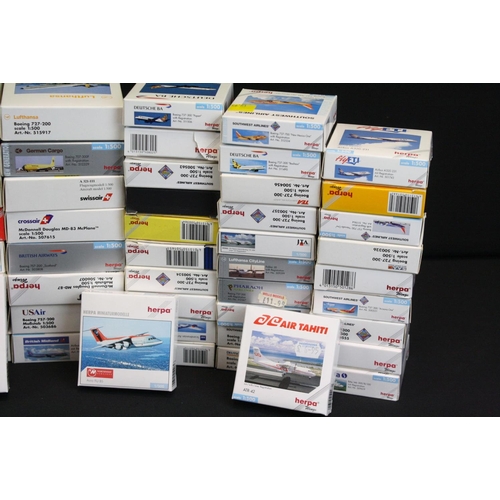 1219 - Over 85 boxed Herpa 1/500 diecast commercial plane models to include Southwest Airlines, Condor, Luf... 