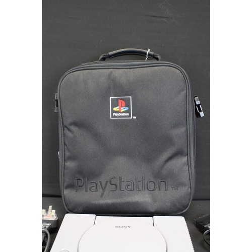 373 - Retro Gaming - PlayStation 1 / PS1 games console with two Playstation controllers, memory card and c... 