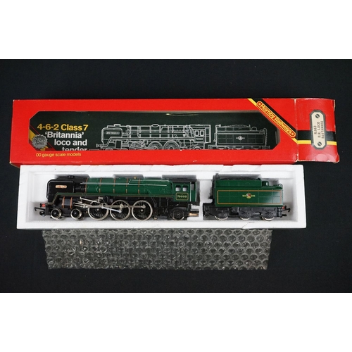 10 - Four boxed Hornby OO gauge locomotives to include R063 BR loco Britannia, R857 BR Loco Ivatt Class 2... 