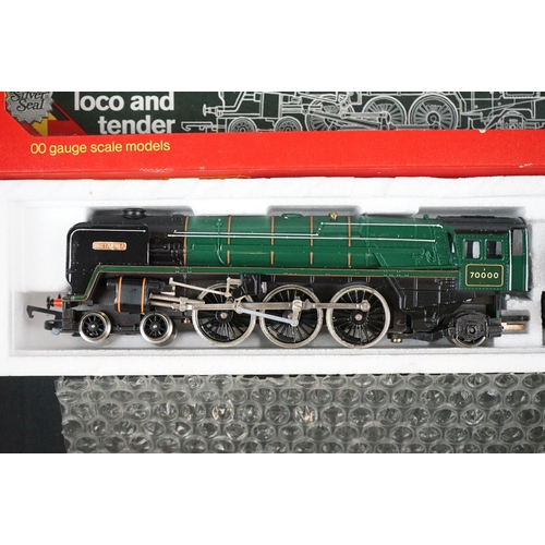 10 - Four boxed Hornby OO gauge locomotives to include R063 BR loco Britannia, R857 BR Loco Ivatt Class 2... 