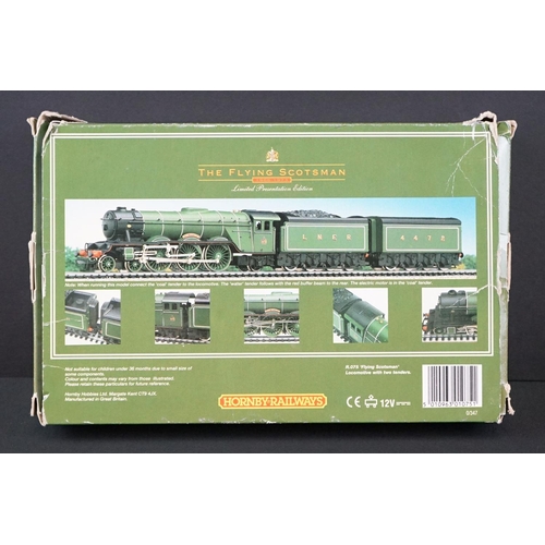 46 - Boxed Hornby OO gauge ltd edn R075 Flying Scotsman locomotive, with certificate, tatty box to one en... 