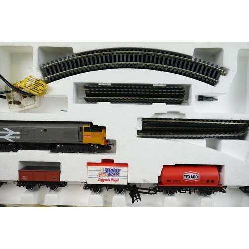 63 - Two boxed Hornby OO gauge train sets to include R726 The Railfreight and R1001 Flying Scotsman, both... 