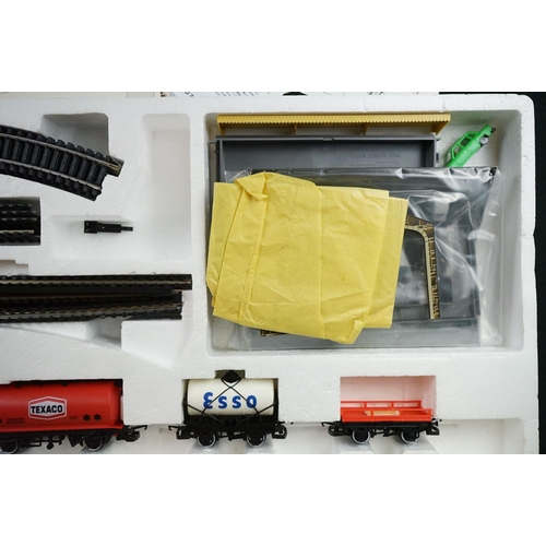 63 - Two boxed Hornby OO gauge train sets to include R726 The Railfreight and R1001 Flying Scotsman, both... 