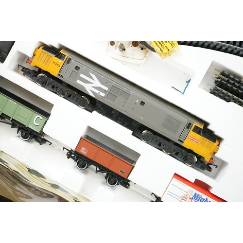 63 - Two boxed Hornby OO gauge train sets to include R726 The Railfreight and R1001 Flying Scotsman, both... 