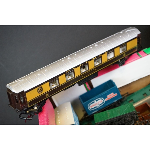 69 - 45 OO gauge items of rolling stock to include coaches and wagons featuring Hornby & Triang examples