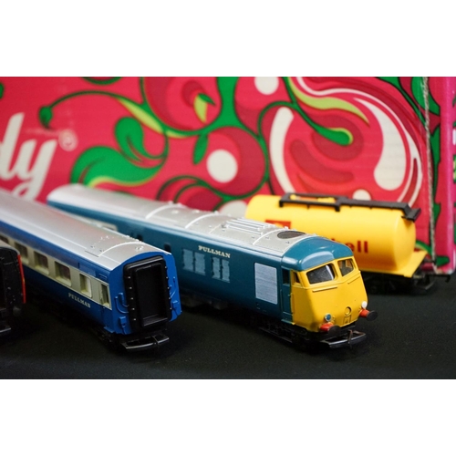 69 - 45 OO gauge items of rolling stock to include coaches and wagons featuring Hornby & Triang examples