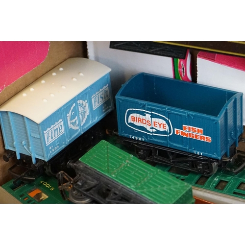 69 - 45 OO gauge items of rolling stock to include coaches and wagons featuring Hornby & Triang examples