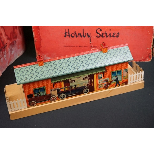 78 - Two boxed Hornby O gauge tin plate trackside accessories to include Railway Station No 2 and Goods P... 