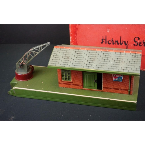 78 - Two boxed Hornby O gauge tin plate trackside accessories to include Railway Station No 2 and Goods P... 