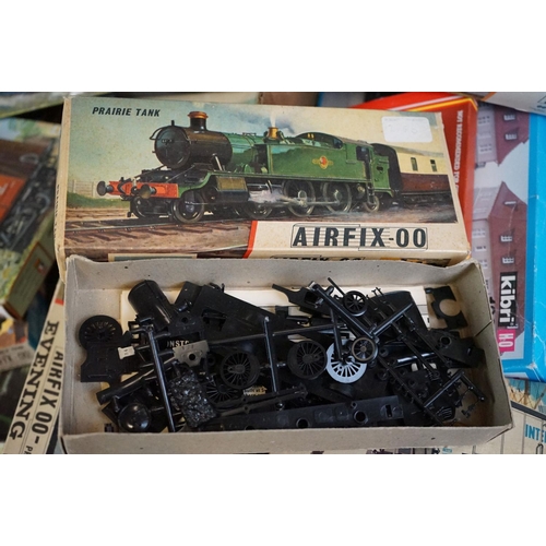 107 - Large collection of boxed OO gauge plastic model railway kits in varying condition, contents uncheck... 